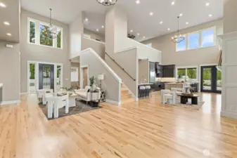 Open Kitchen & Living Space w/ Electric Fireplace. 20 FT Soaring Vaulted Ceilings Throughout main level.
