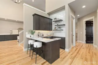 Wet Bar w/ Beverage Fridge & Ice Maker.