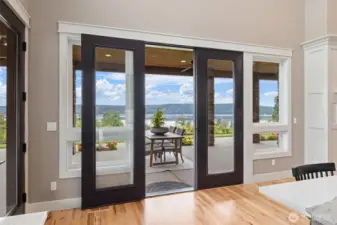 Multiple exterior access points throughout leading to Over 1,000 SF of covered outdoor entertaining space.
