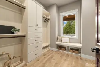 Primary suite "Closet by Design" Walk-in Closet.