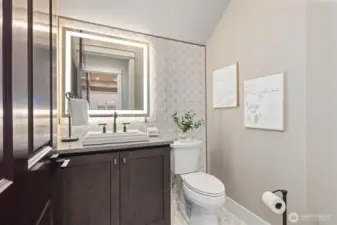 Main floor powder bath. All Bathrooms w/ Amorho LED Lighting Mirrors.