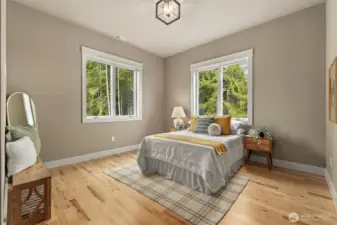Upstairs bedroom 2 w/ walk-in custom closet.