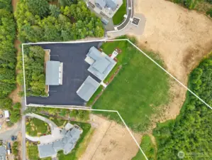 5 Acre estate w/ 3 distinct structures - main home, guest home & garage + additional shop.