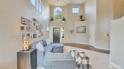 This cozy formal living space offers abundant natural light and an inviting open layout.