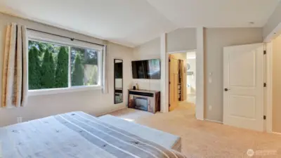 Offering a spacious dual sided closet and seamless flow into the private ensuite.