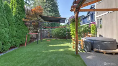 Enjoy low yard maintenance with a turf front and back yard! Play structure stays!