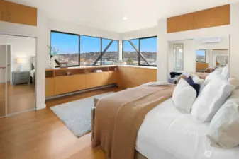 Primary bedroom has stunning views of the water and mountains