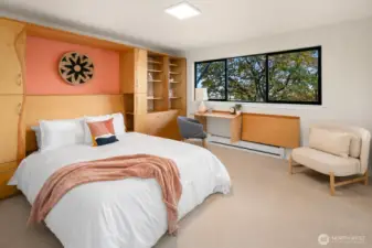 2nd bedroom has built in desks and murphy bed