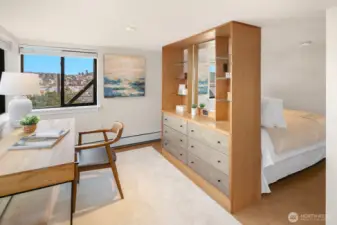Separate 1 bedroom has space for home office or seating area to take in the views