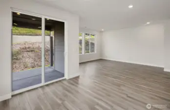 Living room. Open concept. Photo of same design, not this specific house.