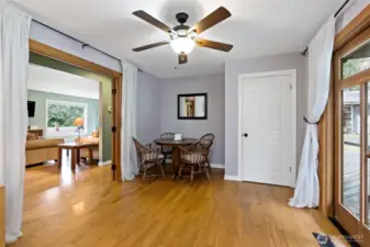 Flow of 3 sets French doors from entryway, through primary bedroom, to back deck!