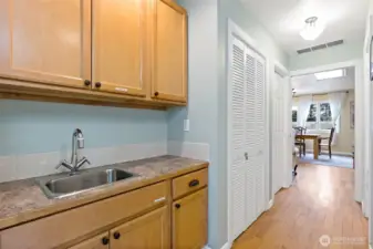 Sink and cabinets in Laundry.