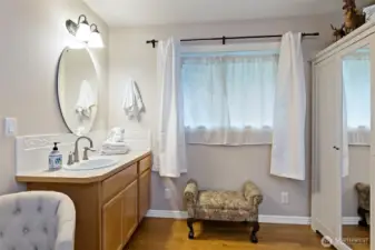Private sink and vanity in additional bedroom/office.