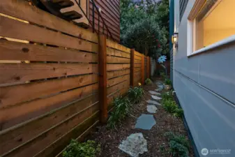 Side of home gardening area.