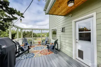 Large deck off the kitchen for easy grilling and al fresco dining.