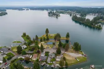 Aerial view of Driftwood Point Park. As a homeowner, you'll enjoy exclusive member-only lake park access, boat launch, swim beach, pickleball, volleyball + more.