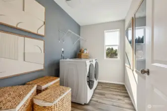 Laundry Room--Photo Disclaimer: Photos are from Noah Model home on Lot 28 and are for informational purposes only. Features, upgrades, colors, and finishes will vary.