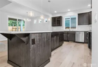 Kitchen features Maple cabinetry.