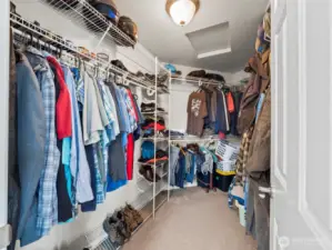 Walk-in closet in primary bathroom