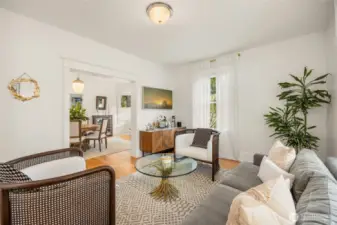 Period trim work in doorways and windows are showcased throughout this beautiful home.