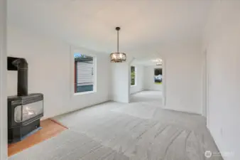 Dining Room with brand new carpet and gas fireplace
