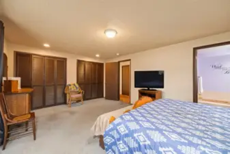 Main House:  Primary Suite offers large closets and entry to the outdoor patio