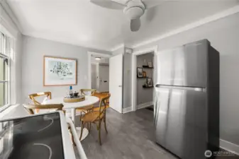 Kitchen has been refreshed with new flooring and paint.