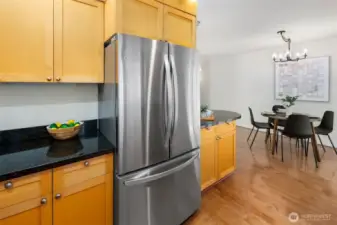 Partial privacy in the kitchen means no one has to see the mess, but you're not too far out of the action either. The best of both worlds.