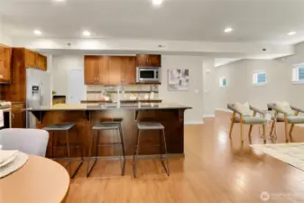 The walk-in pantry adjacent to the kitchen is convenient yet concealed, with lots of additional shelf space.  This pantry provides a place to keep those multi-packs from Costco and just about anything else big and bulky you need to store for your kitchen and entertaining needs.