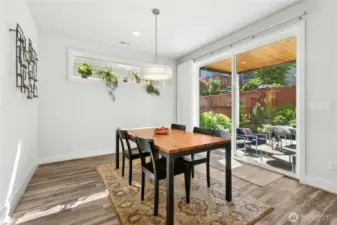 Dining area off covered patio.
