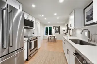 All matching Kitchen-Aid appliances and on-demand filtered water on tap will make food prep a breeze.