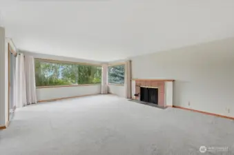 Enormous living room with fireplace.