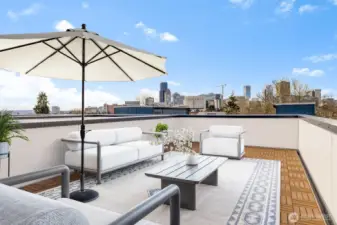Expansive rooftop deck—your private oasis for outdoor lounging and entertaining