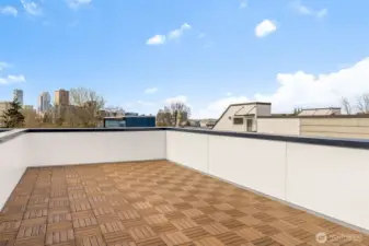 Peaceful primary suite with large windows and a clean, modern aesthetic (virtually staged)