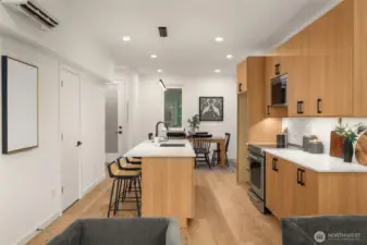 Sleek island seating—ideal for supervising the kitchen while waiting for treats