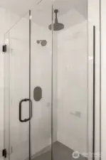 Rainfall shower surrounded by glass & floor to ceiling tile!