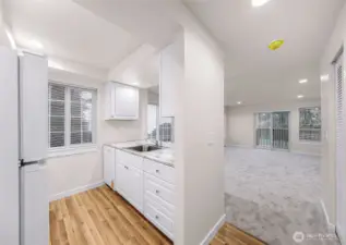 Unit #1 - Extensive capital improvements include all new windows, updated plumbing and electrical, brand-new appliances, and a fully renovated kitchen and bathroom.