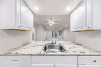 View from Unit #1 kitchen to living room slider (new as well)