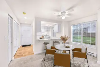 Virtually staged Unit #1 - Entry, kitchen, dining area