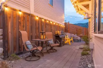 Twilight view of home's east facing patio/outdoor living area.