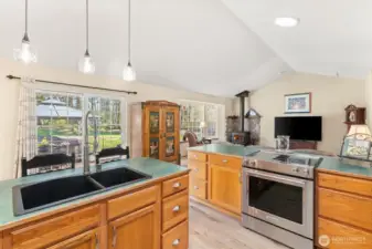Kitchen with sliding glass door to your large deck