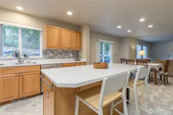 Convenient island for additional prep space and counter seating