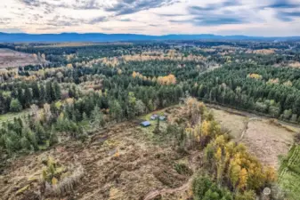 Looking from Northeast toward the Southwest. Shows the house and the remaining acreage clear and dry.