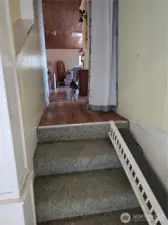 Walk up four stairs to get to main floor