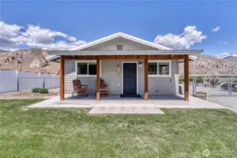 Bauers Landing offers inviting curb appeal with a cozy covered porch, wood beam accents,perfect for relaxing and soaking in the dramatic mountain views.