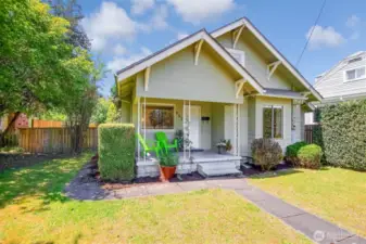 Charming curb appeal with the home thoughtfully set back from the street