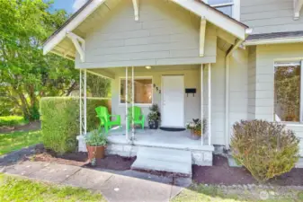 Front yard greenery and classic lines add to the home’s warm personality    Room to relax and entertain by the fire pit area in the backy