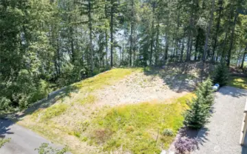 Vacant lot with electric and water on lot.  Great location to create your sanctuary.