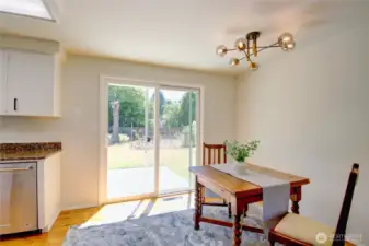 Slider off of kitchen to access a wonderful backyard.  Garden space, fruit trees, private well for irrigation.
