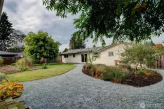 Great backyard with gravel walkways.